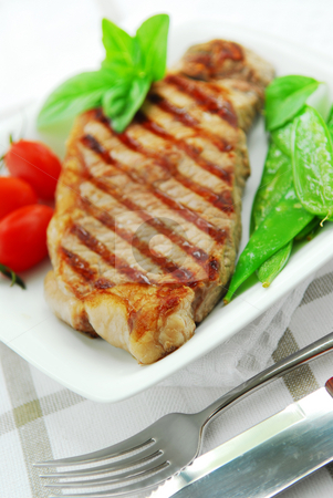To use this stock image in your creative project, please select the size you need over to the right and click the "Add to Cart" button.
Your downloaded image will come with the Cutcaster watermark removed so don’t worry about the watermark you see on this page. Grilled steak stock photo, Grilled New York beef steak served on a plate with vegetables by Elena Elisseeva