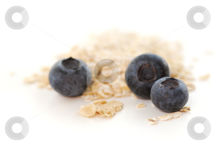 To use this stock image in your creative project, please select the size you need over to the right and click the "Add to Cart" button.
Your downloaded image will come with the Cutcaster watermark removed so don’t worry about the watermark you see on this page. Blueberry oats stock photo, Blueberries and oats macro on white background by Elena Elisseeva