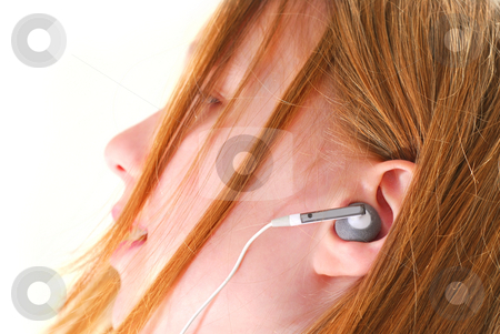 To use this stock image in your creative project, please select the size you need over to the right and click the "Add to Cart" button.
Your downloaded image will come with the Cutcaster watermark removed so don’t worry about the watermark you see on this page. Girl listen music stock photo, Young girl listening to music on her mp3 player by Elena Elisseeva
