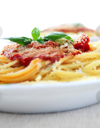 To use this stock image in your creative project, please select the size you need over to the right and click the "Add to Cart" button.
Your downloaded image will come with the Cutcaster watermark removed so don’t worry about the watermark you see on this page. Pasta and tomato sauce stock photo, Pasta with tomato sauce basil and grated parmesan by Elena Elisseeva