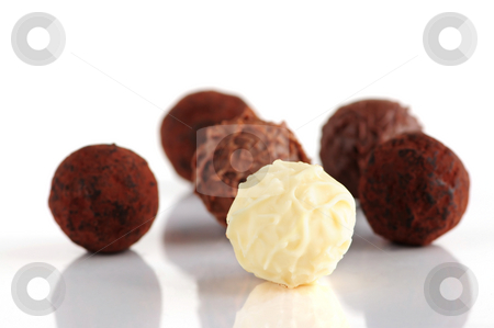 To use this stock image in your creative project, please select the size you need over to the right and click the "Add to Cart" button.
Your downloaded image will come with the Cutcaster watermark removed so don’t worry about the watermark you see on this page. Chocolate truffles stock photo, Several assorted chocolate truffles isolated on white background by Elena Elisseeva