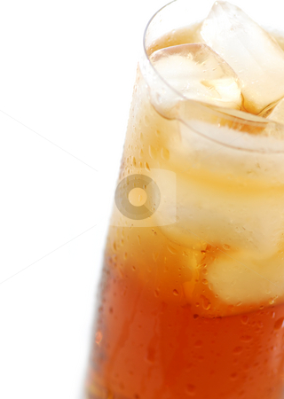 To use this stock image in your creative project, please select the size you need over to the right and click the "Add to Cart" button.
Your downloaded image will come with the Cutcaster watermark removed so don’t worry about the watermark you see on this page. Iced tea stock photo, Glass of cold iced tea with water drops on surface by Elena Elisseeva