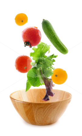 To use this stock image in your creative project, please select the size you need over to the right and click the "Add to Cart" button.
Your downloaded image will come with the Cutcaster watermark removed so don’t worry about the watermark you see on this page. Fresh vegetables falling stock photo, Assorted fresh vegetables falling into a wooden salad bowl isolated on white background by Elena Elisseeva