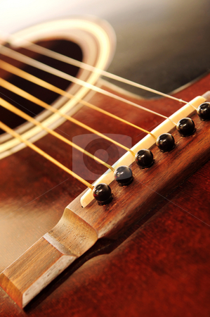 To use this stock image in your creative project, please select the size you need over to the right and click the "Add to Cart" button.
Your downloaded image will come with the Cutcaster watermark removed so don’t worry about the watermark you see on this page. Guitar bridge stock photo, Acoustic guitar bridge and strings close up by Elena Elisseeva