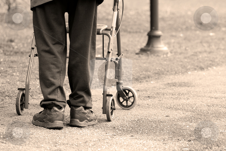 To use this stock image in your creative project, please select the size you need over to the right and click the "Add to Cart" button.
Your downloaded image will come with the Cutcaster watermark removed so don’t worry about the watermark you see on this page. Old age stock photo, Senior man taking a walk in a park with the aid of a walking frame by Elena Elisseeva