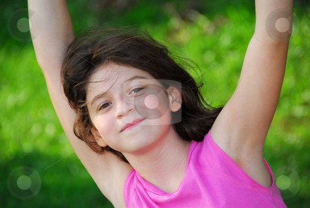To use this stock image in your creative project, please select the size you need over to the right and click the "Add to Cart" button.
Your downloaded image will come with the Cutcaster watermark removed so don’t worry about the watermark you see on this page. Girl stock photo, Portrait of a young girl playing on a playground at summertime by Elena Elisseeva