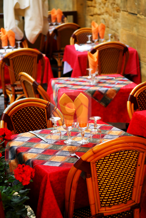 To use this stock image in your creative project, please select the size you need over to the right and click the "Add to Cart" button.
Your downloaded image will come with the Cutcaster watermark removed so don’t worry about the watermark you see on this page. Restaurant patio stock photo, Set tables with tablecloth and glasses on restaurant outdoor patio by Elena Elisseeva