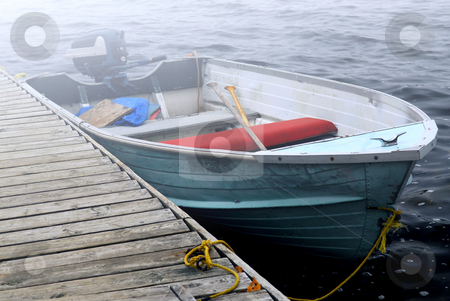 To use this stock image in your creative project, please select the size you need over to the right and click the "Add to Cart" button.
Your downloaded image will come with the Cutcaster watermark removed so don’t worry about the watermark you see on this page. Boat in a fog stock photo, Empty old boat at a dock on a misty lake by Elena Elisseeva