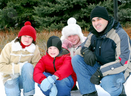 To use this stock image in your creative project, please select the size you need over to the right and click the "Add to Cart" button.
Your downloaded image will come with the Cutcaster watermark removed so don’t worry about the watermark you see on this page. Family portrait stock photo, Portrait of a happy family in winter park by Elena Elisseeva