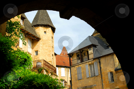 To use this stock image in your creative project, please select the size you need over to the right and click the "Add to Cart" button.
Your downloaded image will come with the Cutcaster watermark removed so don’t worry about the watermark you see on this page. Medieval Sarlat, France stock photo, View from the arch in medieval town of Sarlat, France by Elena Elisseeva