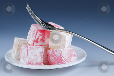 To use this stock image in your creative project, please select the size you need over to the right and click the "Add to Cart" button.
Your downloaded image will come with the Cutcaster watermark removed so don’t worry about the watermark you see on this page. Turkish delight stock photo, Turkish delight (lokum) confection on a white dessert plate by Elena Elisseeva