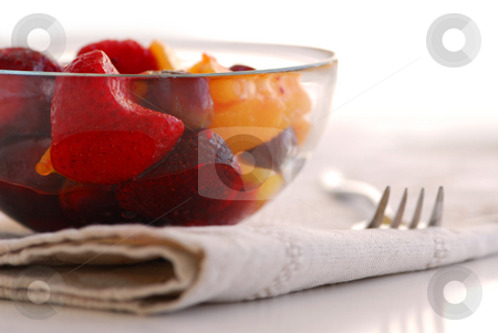 To use this stock image in your creative project, please select the size you need over to the right and click the "Add to Cart" button.
Your downloaded image will come with the Cutcaster watermark removed so don’t worry about the watermark you see on this page. Fruit salad stock photo, Serving of fruit salad with fork and napkin by Elena Elisseeva