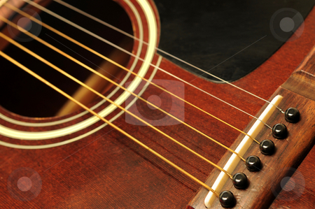 To use this stock image in your creative project, please select the size you need over to the right and click the "Add to Cart" button.
Your downloaded image will come with the Cutcaster watermark removed so don’t worry about the watermark you see on this page. Guitar close up stock photo, Acoustic guitar bridge and strings close up by Elena Elisseeva