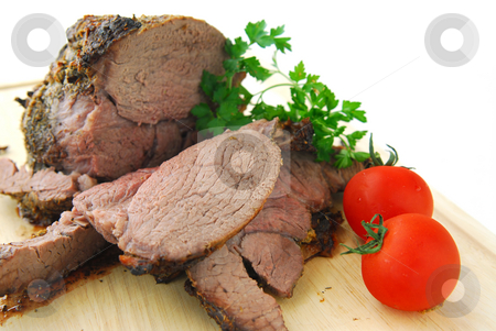 To use this stock image in your creative project, please select the size you need over to the right and click the "Add to Cart" button.
Your downloaded image will come with the Cutcaster watermark removed so don’t worry about the watermark you see on this page. Beef roast stock photo, Beef roast cut on a cutting board by Elena Elisseeva