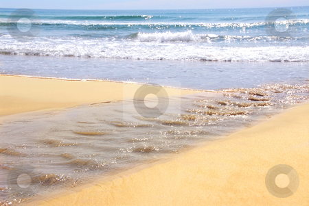 To use this stock image in your creative project, please select the size you need over to the right and click the "Add to Cart" button.
Your downloaded image will come with the Cutcaster watermark removed so don’t worry about the watermark you see on this page. Ocean shore stock photo, Ocean shore with sandy beach and small tributary by Elena Elisseeva