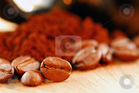 To use this stock image in your creative project, please select the size you need over to the right and click the "Add to Cart" button.
Your downloaded image will come with the Cutcaster watermark removed so don’t worry about the watermark you see on this page. Coffee beans and ground coffee stock photo, Macro image of coffee beans and ground coffee with black coffee cup by Elena Elisseeva