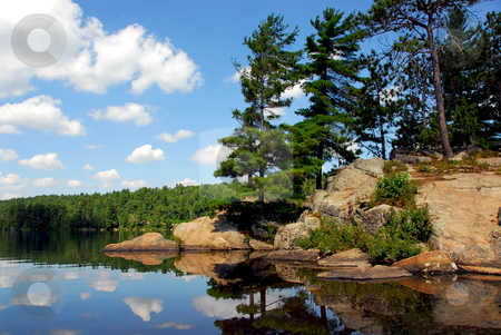 To use this stock image in your creative project, please select the size you need over to the right and click the "Add to Cart" button.
Your downloaded image will come with the Cutcaster watermark removed so don’t worry about the watermark you see on this page. Scenic lake stock photo, Scenic lake landscape at Algonquin provincial park, Ontario, Canada by Elena Elisseeva