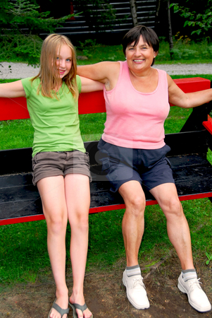 To use this stock image in your creative project, please select the size you need over to the right and click the "Add to Cart" button.
Your downloaded image will come with the Cutcaster watermark removed so don’t worry about the watermark you see on this page. Family on swings stock photo, Grandmother and granddaughter on swings by Elena Elisseeva