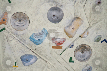 To use this stock image in your creative project, please select the size you need over to the right and click the "Add to Cart" button.
Your downloaded image will come with the Cutcaster watermark removed so don’t worry about the watermark you see on this page. Rock climbing wall stock photo, Close up of a rock climbing wall by Jonas Marcos San Luis