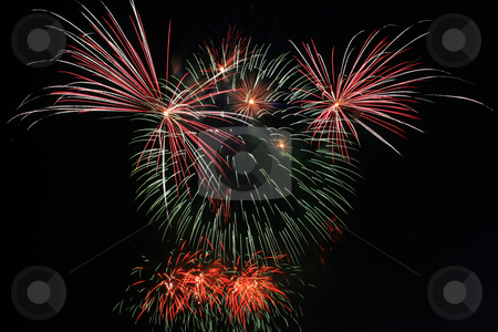 To use this stock image in your creative project, please select the size you need over to the right and click the "Add to Cart" button.
Your downloaded image will come with the Cutcaster watermark removed so don’t worry about the watermark you see on this page. Teddybear fireworks stock photo, Colorful teddybear shaped fireworks against the dark sky by Jonas Marcos San Luis