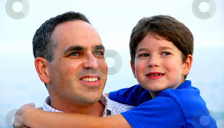 To use this stock image in your creative project, please select the size you need over to the right and click the "Add to Cart" button.
Your downloaded image will come with the Cutcaster watermark removed so don’t worry about the watermark you see on this page. Father son portrait stock photo, Portrait of a father holding his son by Elena Elisseeva