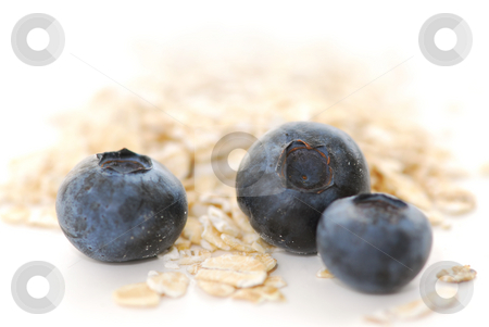 To use this stock image in your creative project, please select the size you need over to the right and click the "Add to Cart" button.
Your downloaded image will come with the Cutcaster watermark removed so don’t worry about the watermark you see on this page. Blueberry oats stock photo, Blueberries and oats macro on white background by Elena Elisseeva