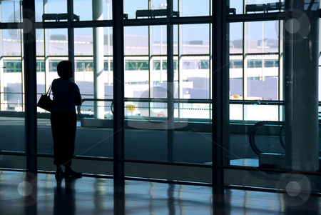 To use this stock image in your creative project, please select the size you need over to the right and click the "Add to Cart" button.
Your downloaded image will come with the Cutcaster watermark removed so don’t worry about the watermark you see on this page. Woman airport stock photo, Woman waiting at the international airport terminal by Elena Elisseeva