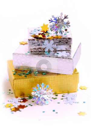 To use this stock image in your creative project, please select the size you need over to the right and click the "Add to Cart" button.
Your downloaded image will come with the Cutcaster watermark removed so don’t worry about the watermark you see on this page. Christmas boxes stock photo, Christmas gift boxes on white background by Elena Elisseeva
