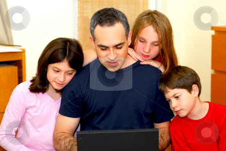 To use this stock image in your creative project, please select the size you need over to the right and click the "Add to Cart" button.
Your downloaded image will come with the Cutcaster watermark removed so don’t worry about the watermark you see on this page. Family computer stock photo, Father and children looking into a portable computer at home by Elena Elisseeva