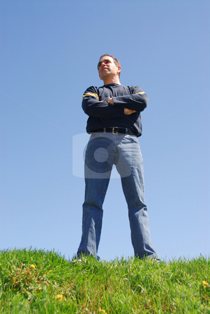 To use this stock image in your creative project, please select the size you need over to the right and click the "Add to Cart" button.
Your downloaded image will come with the Cutcaster watermark removed so don’t worry about the watermark you see on this page. Looking to the future stock photo, Man standing on top of a hill, looking to the future by Elena Elisseeva