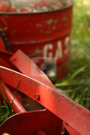 To use this stock image in your creative project, please select the size you need over to the right and click the "Add to Cart" button.
Your downloaded image will come with the Cutcaster watermark removed so don’t worry about the watermark you see on this page. You Choose stock photo, An environmentally friendly red push mower beside an old-fashioned red can of gasoline, both sitting in a lawn that needs cutting or mowing. by Jessica Tooley