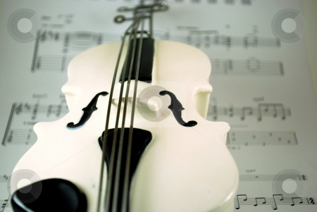 To use this stock image in your creative project, please select the size you need over to the right and click the "Add to Cart" button.
Your downloaded image will come with the Cutcaster watermark removed so don’t worry about the watermark you see on this page. Bass with sheet music stock photo, Bass against sheet music by Robert Cabrera