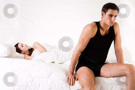 To use this stock image in your creative project, please select the size you need over to the right and click the "Add to Cart" button.
Your downloaded image will come with the Cutcaster watermark removed so don’t worry about the watermark you see on this page. Relation problematic stock photo, Young adult couple in the studio on a bed by Frenk and Danielle Kaufmann