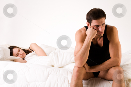 To use this stock image in your creative project, please select the size you need over to the right and click the "Add to Cart" button.
Your downloaded image will come with the Cutcaster watermark removed so don’t worry about the watermark you see on this page. Relation problems stock photo, Young adult couple in the studio on a bed by Frenk and Danielle Kaufmann