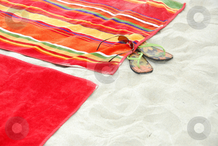 To use this stock image in your creative project, please select the size you need over to the right and click the "Add to Cart" button.
Your downloaded image will come with the Cutcaster watermark removed so don’t worry about the watermark you see on this page. Beach towels on sand stock photo, Colorful beach towels on sandy beach by Elena Elisseeva