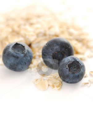 To use this stock image in your creative project, please select the size you need over to the right and click the "Add to Cart" button.
Your downloaded image will come with the Cutcaster watermark removed so don’t worry about the watermark you see on this page. Blueberry oats stock photo, Blueberries and oats macro on white background by Elena Elisseeva