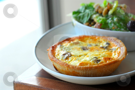 To use this stock image in your creative project, please select the size you need over to the right and click the "Add to Cart" button.
Your downloaded image will come with the Cutcaster watermark removed so don’t worry about the watermark you see on this page. Quiche and salad stock photo, Quiche and caesar salad by Elena Elisseeva