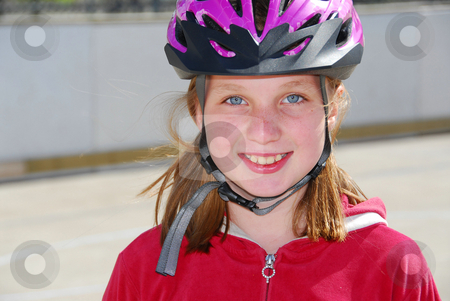 To use this stock image in your creative project, please select the size you need over to the right and click the "Add to Cart" button.
Your downloaded image will come with the Cutcaster watermark removed so don’t worry about the watermark you see on this page. Girl child helmet stock photo, Portrait of a young girl rolleblading in a helmet by Elena Elisseeva