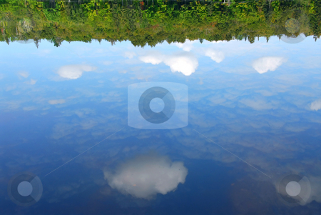 To use this stock image in your creative project, please select the size you need over to the right and click the "Add to Cart" button.
Your downloaded image will come with the Cutcaster watermark removed so don’t worry about the watermark you see on this page. Reflections water stock photo, Reflections of clouds and forest in a still water of a wilderness lake by Elena Elisseeva