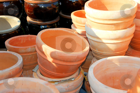 To use this stock image in your creative project, please select the size you need over to the right and click the "Add to Cart" button.
Your downloaded image will come with the Cutcaster watermark removed so don’t worry about the watermark you see on this page. Clay pots stock photo, Clay pots for sale by Elena Elisseeva