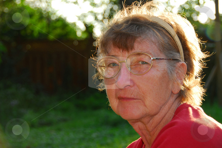 To use this stock image in your creative project, please select the size you need over to the right and click the "Add to Cart" button.
Your downloaded image will come with the Cutcaster watermark removed so don’t worry about the watermark you see on this page. Senior woman stock photo, Portrait of a senior woman outside by Elena Elisseeva