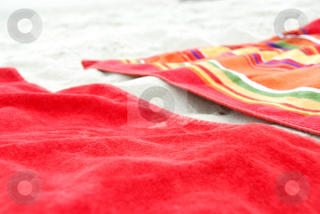 To use this stock image in your creative project, please select the size you need over to the right and click the "Add to Cart" button.
Your downloaded image will come with the Cutcaster watermark removed so don’t worry about the watermark you see on this page. Beach towels on sand stock photo, Two colorful beach towels on sandy beach by Elena Elisseeva