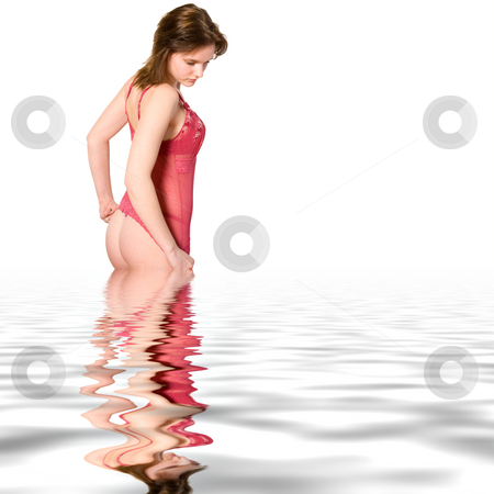 To use this stock image in your creative project, please select the size you need over to the right and click the "Add to Cart" button.
Your downloaded image will come with the Cutcaster watermark removed so don’t worry about the watermark you see on this page. White woman in red lingery standing in a pool stock photo, Studio portrait of a young woman in red lingerie on a white background standing in water by Frenk and Danielle Kaufmann