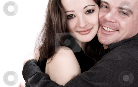 To use this stock image in your creative project, please select the size you need over to the right and click the "Add to Cart" button.
Your downloaded image will come with the Cutcaster watermark removed so don’t worry about the watermark you see on this page. Loving her stock photo, Girlfriend and boyfriend hugging by Frenk and Danielle Kaufmann
