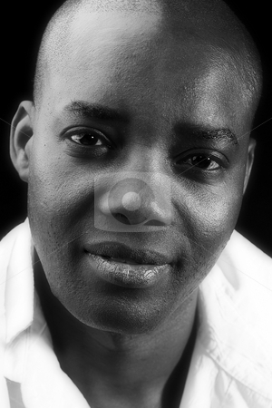 To use this stock image in your creative project, please select the size you need over to the right and click the "Add to Cart" button.
Your downloaded image will come with the Cutcaster watermark removed so don’t worry about the watermark you see on this page. Black and white African male stock photo, Studio portrait of a Black and white African male by Frenk and Danielle Kaufmann