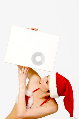To use this stock image in your creative project, please select the size you need over to the right and click the "Add to Cart" button.
Your downloaded image will come with the Cutcaster watermark removed so don’t worry about the watermark you see on this page. Christmas helper with copy space stock photo, Girl in christmas lingerie holding up a blank sign by Frenk and Danielle Kaufmann