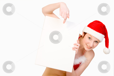 To use this stock image in your creative project, please select the size you need over to the right and click the "Add to Cart" button.
Your downloaded image will come with the Cutcaster watermark removed so don’t worry about the watermark you see on this page. Christmas girl holding up a white sign for copyspace stock photo, Beautifull girl in christmas bikini and with christmas hat is hlding up a white sign for copy space. With background clipping path for your convenience by Frenk and Danielle Kaufmann