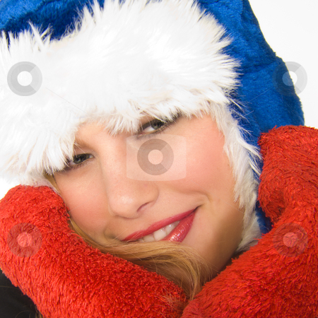 To use this stock image in your creative project, please select the size you need over to the right and click the "Add to Cart" button.
Your downloaded image will come with the Cutcaster watermark removed so don’t worry about the watermark you see on this page. Christmas faerie in square frame stock photo, Portrait of a beautiful blond model with a Christmas hat by Frenk and Danielle Kaufmann