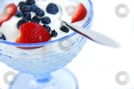 To use this stock image in your creative project, please select the size you need over to the right and click the "Add to Cart" button.
Your downloaded image will come with the Cutcaster watermark removed so don’t worry about the watermark you see on this page. Yogurt in glass bowl stock photo, Healthy breakfast of yogurt and berries by Elena Elisseeva