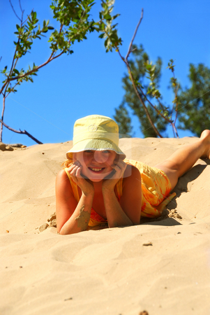 To use this stock image in your creative project, please select the size you need over to the right and click the "Add to Cart" button.
Your downloaded image will come with the Cutcaster watermark removed so don’t worry about the watermark you see on this page. Girl dunes stock photo, Young girl in yellow hat sitting on top of a sand dune by Elena Elisseeva